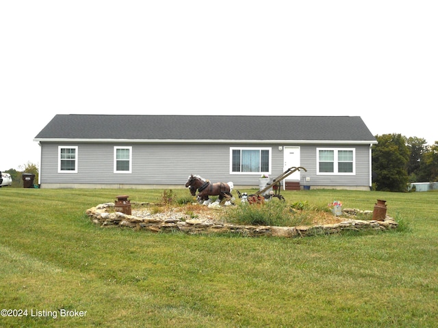 view of front of house with a front lawn