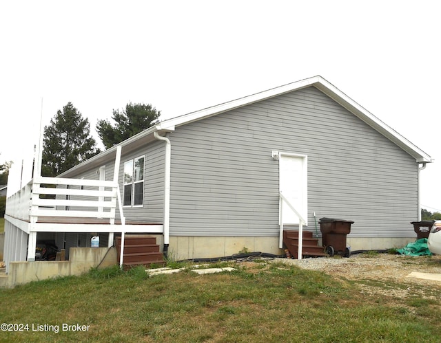 2608 Hickory Ridge Rd, Mount Eden, KY 40046 - view of side of home with a wooden deck, a yard, and entry steps