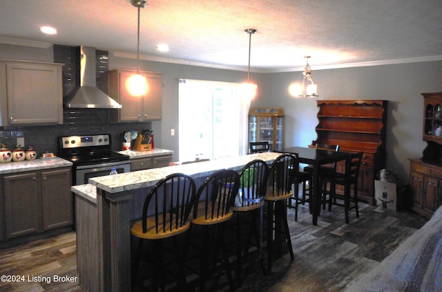 2608 Hickory Ridge Rd, Mount Eden, KY 40046 - kitchen with dark wood finished floors, stainless steel range with electric cooktop, wall chimney exhaust hood, and crown molding