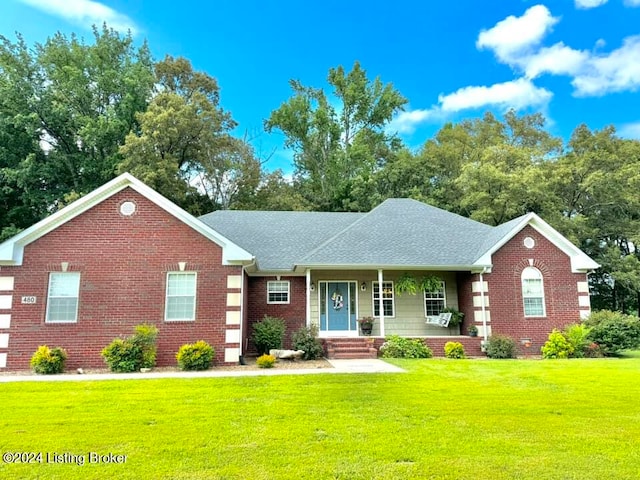 ranch-style house with a front lawn