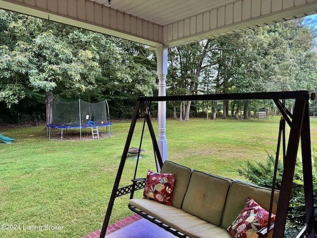 view of yard with a trampoline