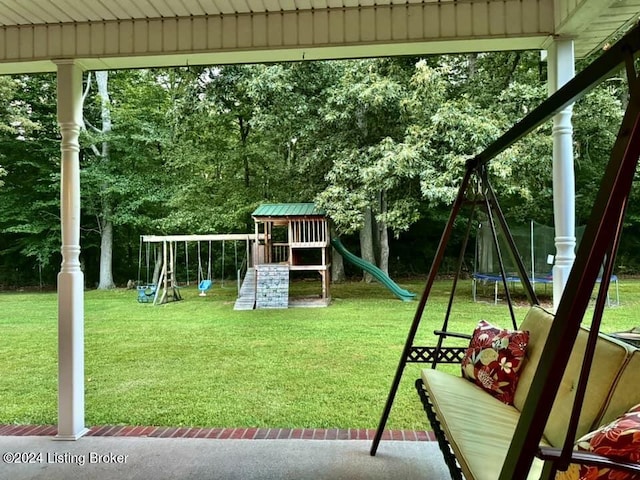 view of playground with a yard