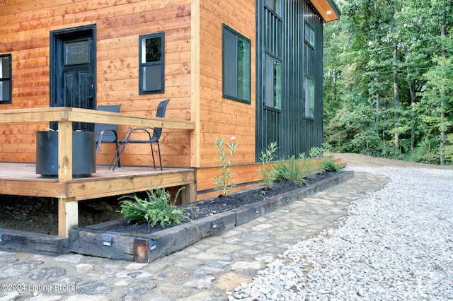 view of side of home featuring a deck