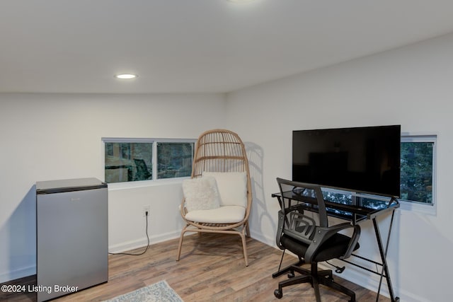 office space featuring recessed lighting, baseboards, and wood finished floors