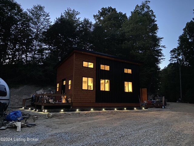 view of outdoor structure at dusk