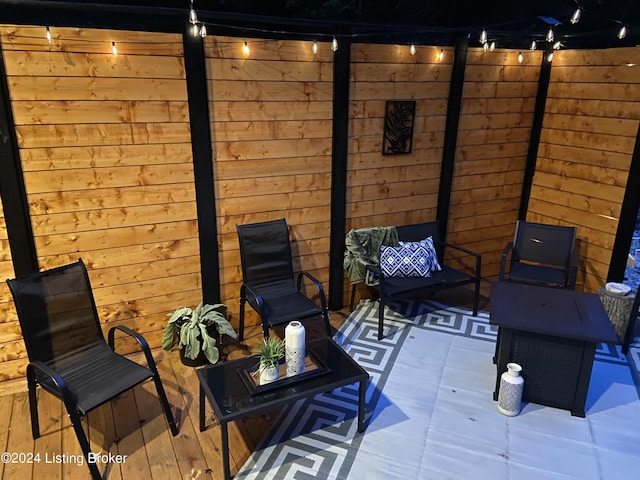 view of patio featuring fence