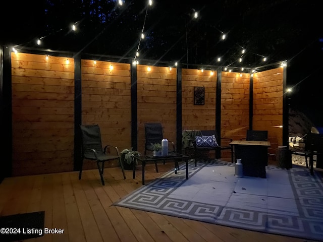 view of deck at twilight