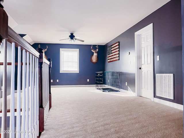 interior space featuring ceiling fan