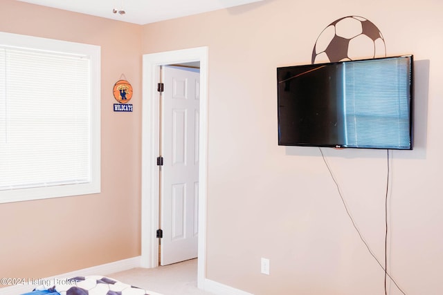 unfurnished bedroom featuring carpet floors