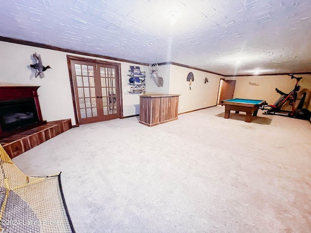 rec room featuring carpet, ornamental molding, billiards, and french doors