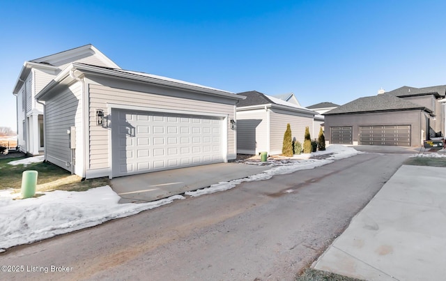 ranch-style home featuring a garage