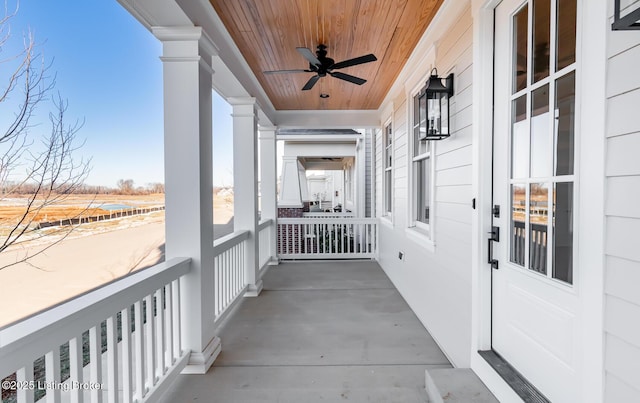 balcony featuring ceiling fan