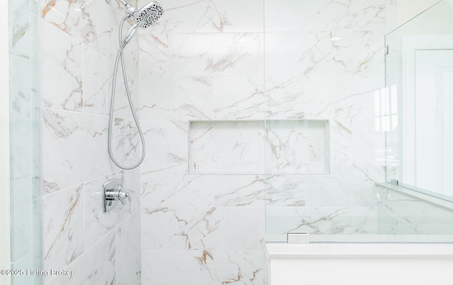 bathroom featuring tiled shower