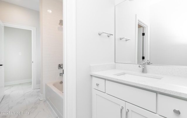 bathroom with bathing tub / shower combination and vanity