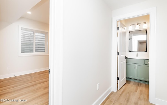 hallway featuring light hardwood / wood-style floors