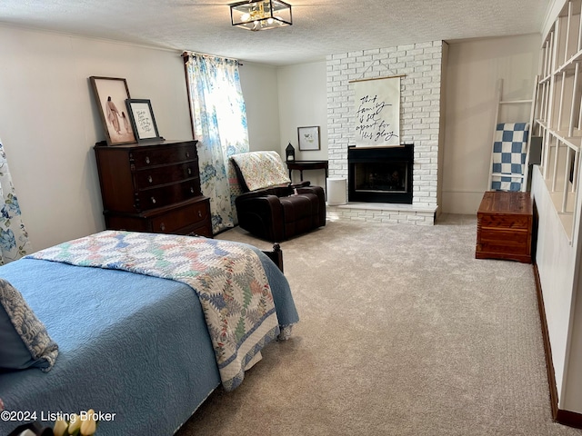 bedroom featuring a textured ceiling, a fireplace, and carpet