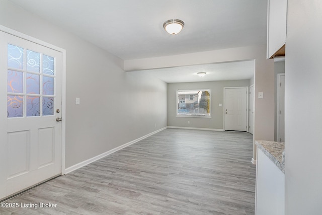 entrance foyer with light hardwood / wood-style floors