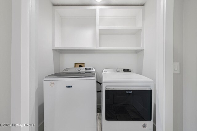 laundry area featuring independent washer and dryer