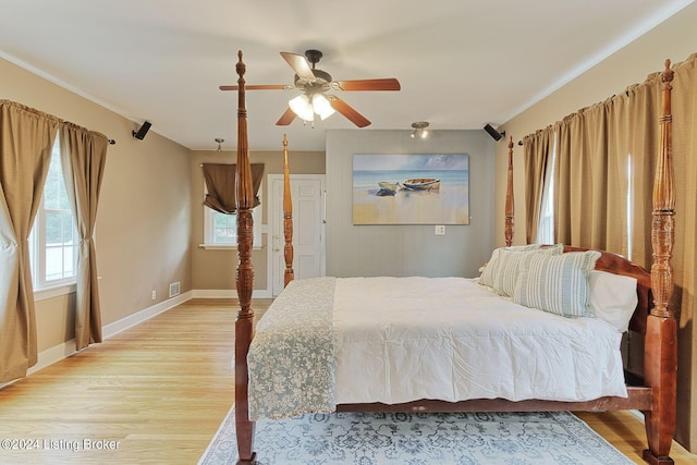 unfurnished bedroom with light hardwood / wood-style flooring and ceiling fan