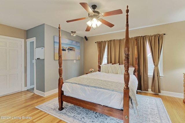 bedroom featuring ceiling fan and light hardwood / wood-style floors