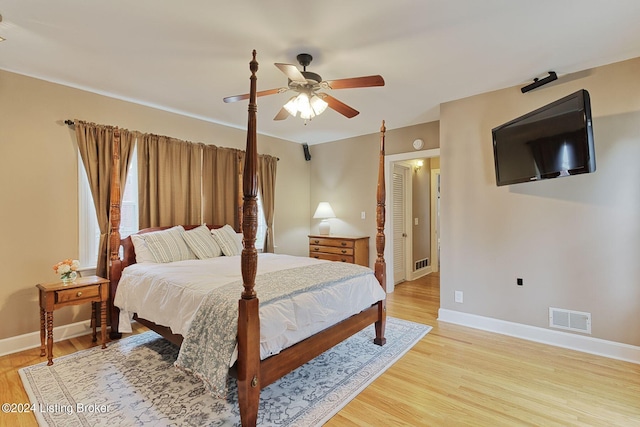 bedroom featuring light wood-type flooring and ceiling fan