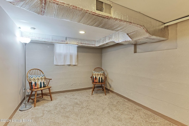 sitting room featuring carpet floors