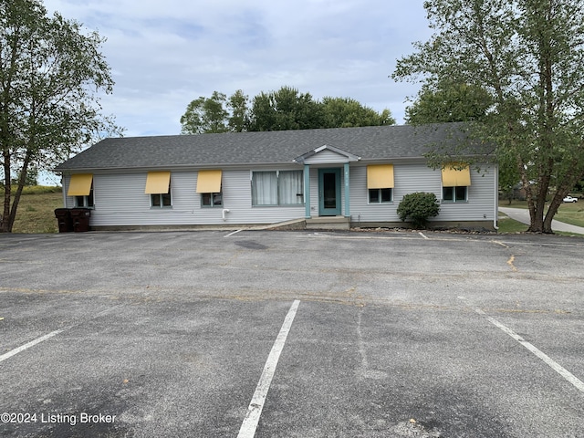 8910 Main St, Campbellsburg, KY 40011 - view of front of property featuring uncovered parking and roof with shingles