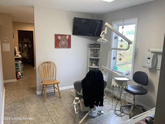 8910 Main St, Campbellsburg, KY 40011 - rec room featuring light tile patterned flooring, baseboards, and a wealth of natural light