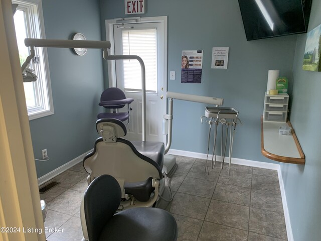 exercise area with tile patterned floors