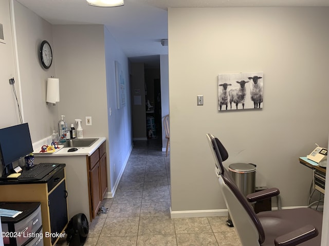 8910 Main St, Campbellsburg, KY 40011 - office featuring baseboards, a sink, and light tile patterned floors