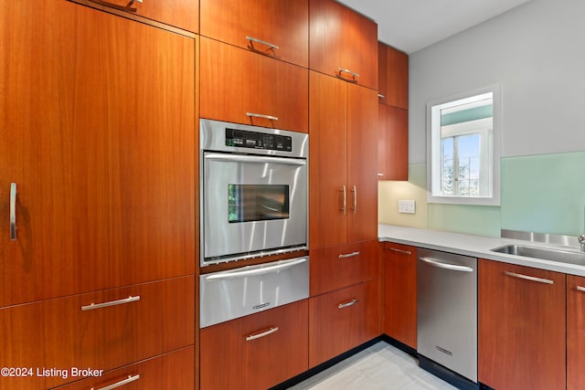 kitchen with sink and stainless steel appliances