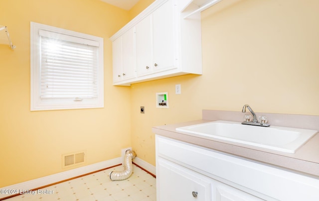 laundry area featuring cabinets, hookup for an electric dryer, washer hookup, and sink