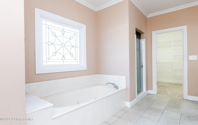 bathroom with plus walk in shower, tile patterned flooring, and ornamental molding