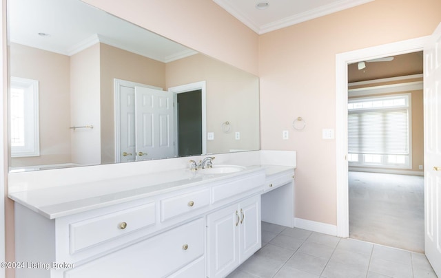 bathroom featuring ornamental molding, tile patterned flooring, and vanity