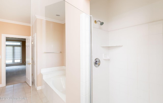 bathroom with tile patterned flooring, crown molding, and separate shower and tub