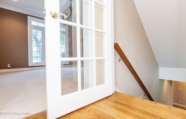 interior space with crown molding and hardwood / wood-style floors