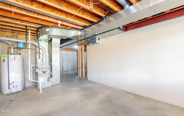 basement with gas water heater and heating unit