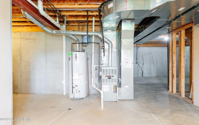 utility room with gas water heater