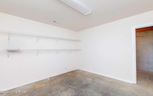 interior space featuring concrete floors