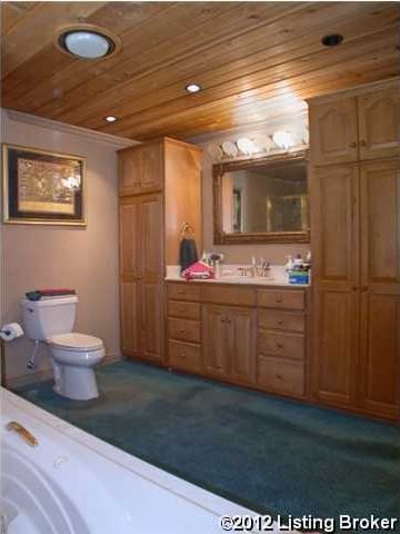 bathroom featuring toilet, wooden ceiling, vanity, and recessed lighting