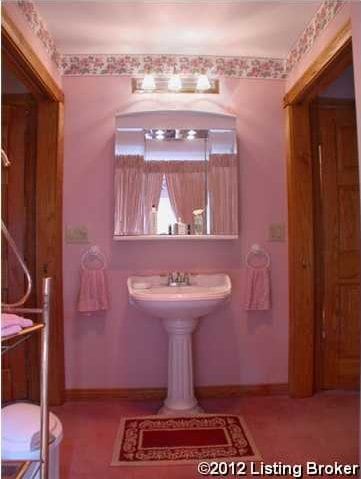 bathroom featuring baseboards