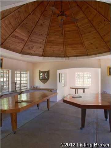 rec room featuring high vaulted ceiling and wooden ceiling