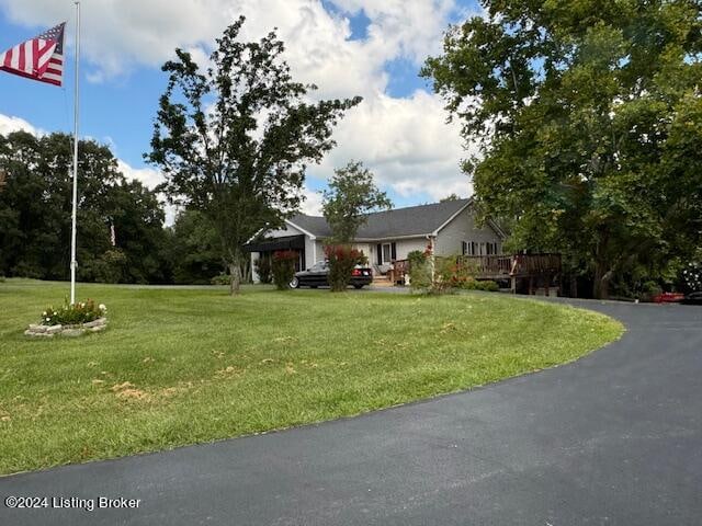 view of front of home featuring a front lawn