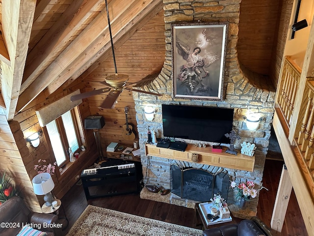 living room with wood walls, dark wood-type flooring, high vaulted ceiling, and wooden ceiling