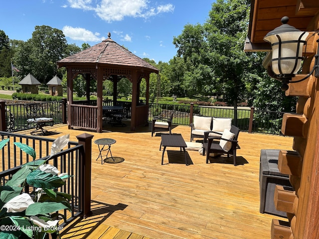 wooden deck with a gazebo