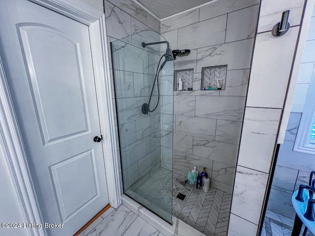 bathroom with an enclosed shower