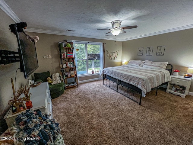 carpeted bedroom featuring ceiling fan, a textured ceiling, and ornamental molding