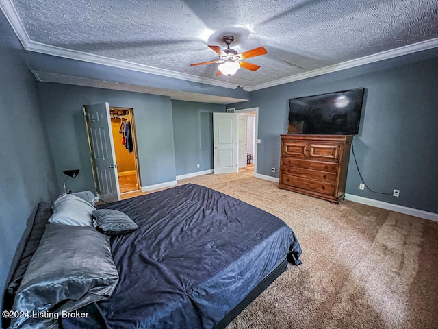 bedroom featuring ornamental molding, ceiling fan, and a textured ceiling