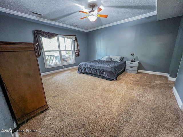 bedroom with carpet, ceiling fan, crown molding, and a textured ceiling