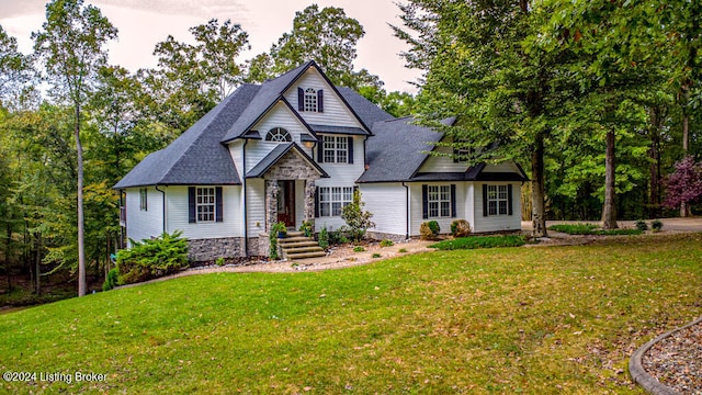 view of front of home with a yard